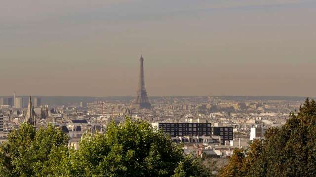 A panoramic view of Paris and the Eiffel Tower.