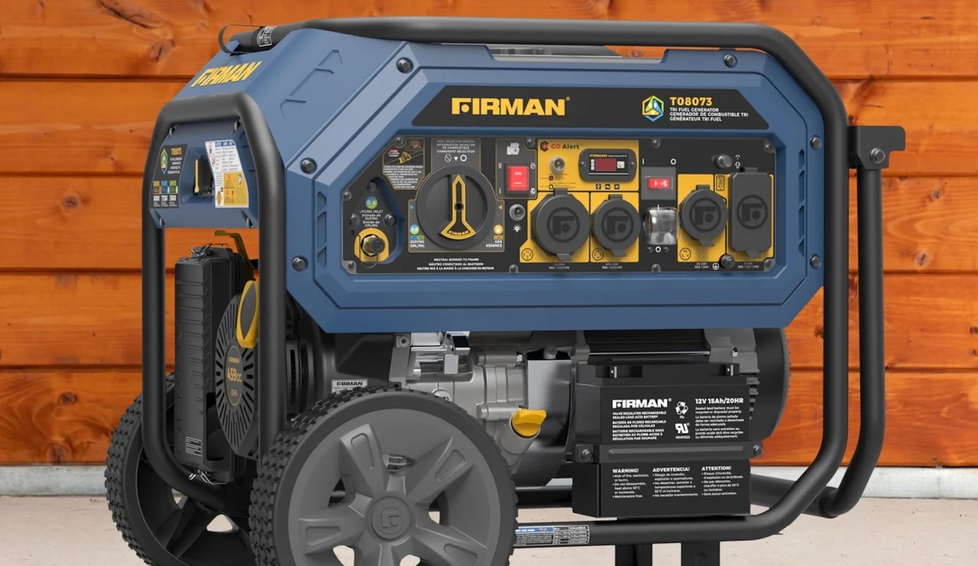 A blue and yellow tri-fuel generator with multiple outlets and a control panel.