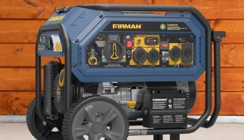 A blue and yellow tri-fuel generator with multiple outlets and a control panel.