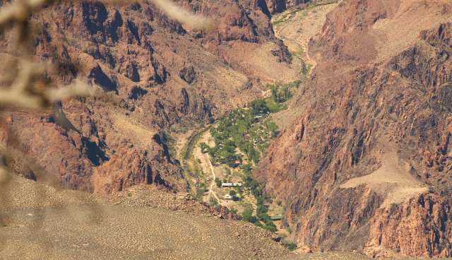 The Grand Canyon's Phantom Ranch surrounded by rugged, rocky mountains.