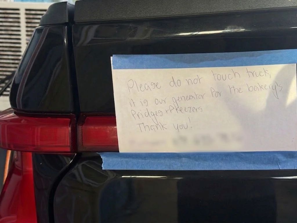 The truck with a sign asking people not to touch it.
