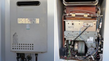 A gas water heater unit with visible brand label and internal components.