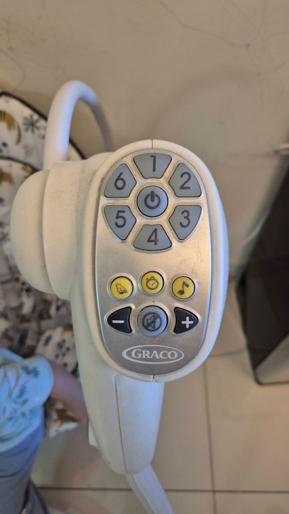 A Graco baby swing remote.