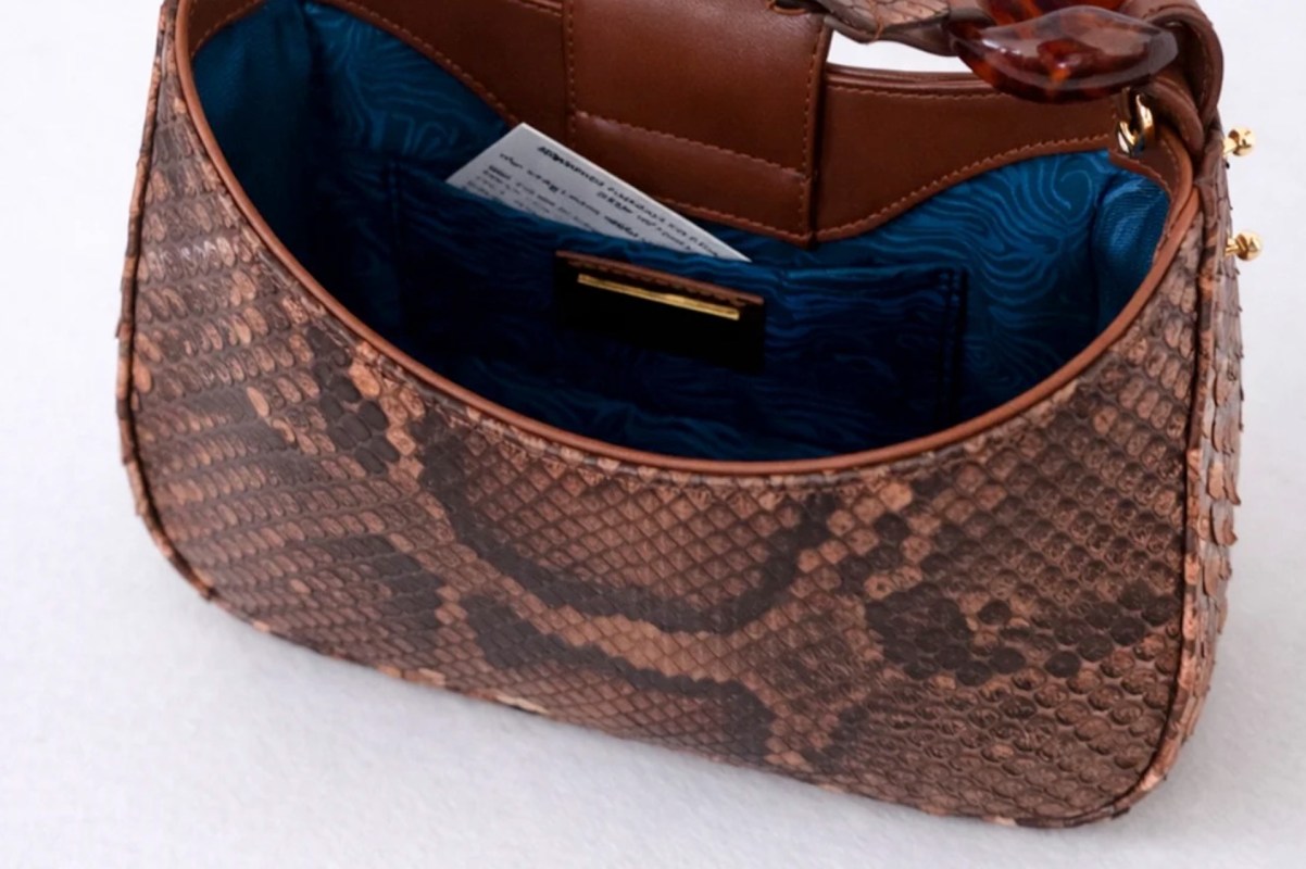 A snakeskin bag.