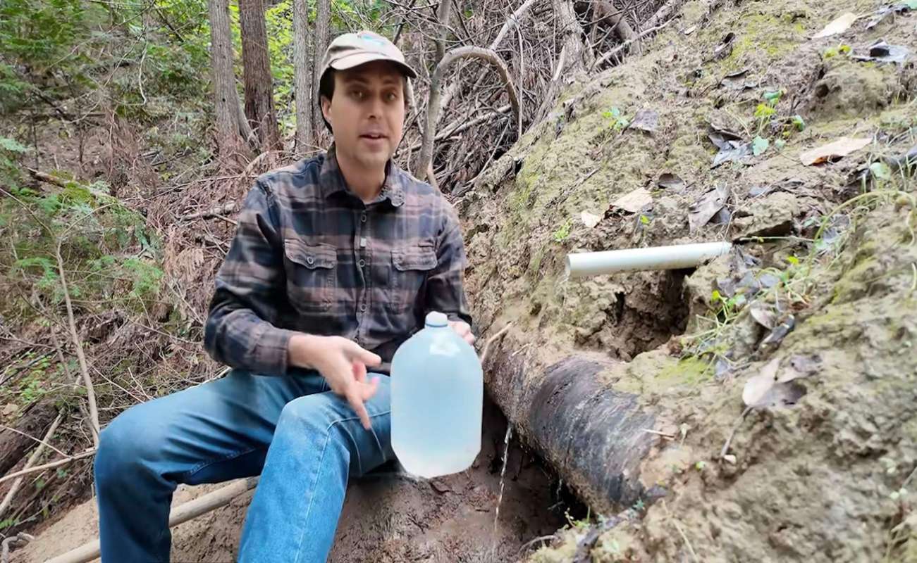 A person with a water jug.