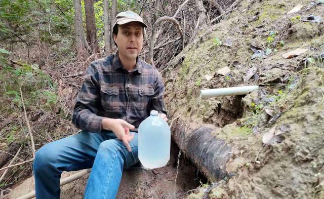A person with a water jug.