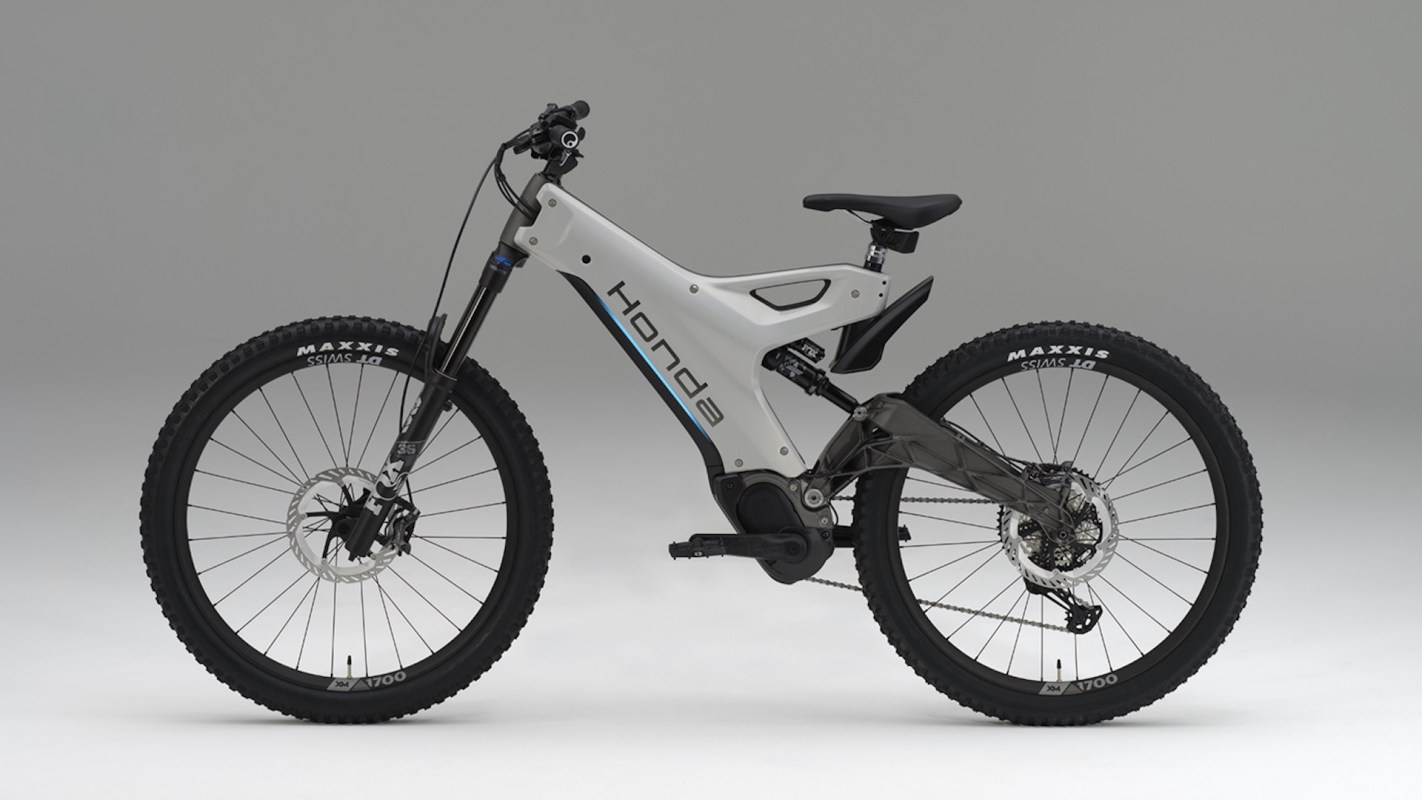 An electric mountain bike with a sleek design and large tires.