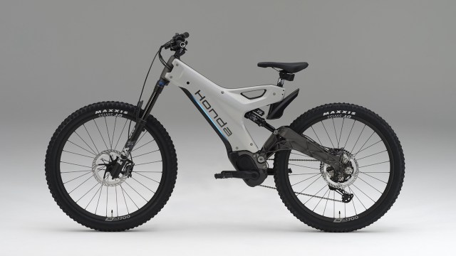 An electric mountain bike with a sleek design and large tires.