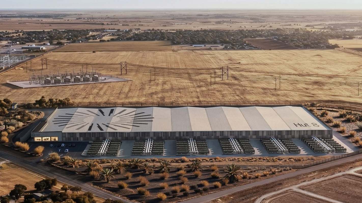 A large industrial data center labeled "Hut 8" with rows of equipment in an open landscape.