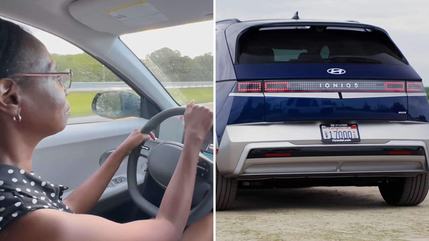 A woman drives an electric car, featuring a view of the road alongside her and the rear of the vehicle.