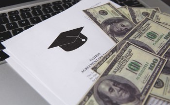 Hundred dollar bills near grad cap clip art.