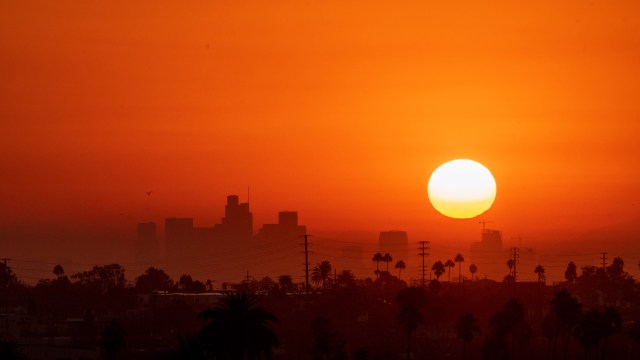 The sun in an orange sky.