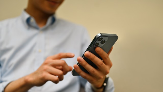A person using a smartphone.