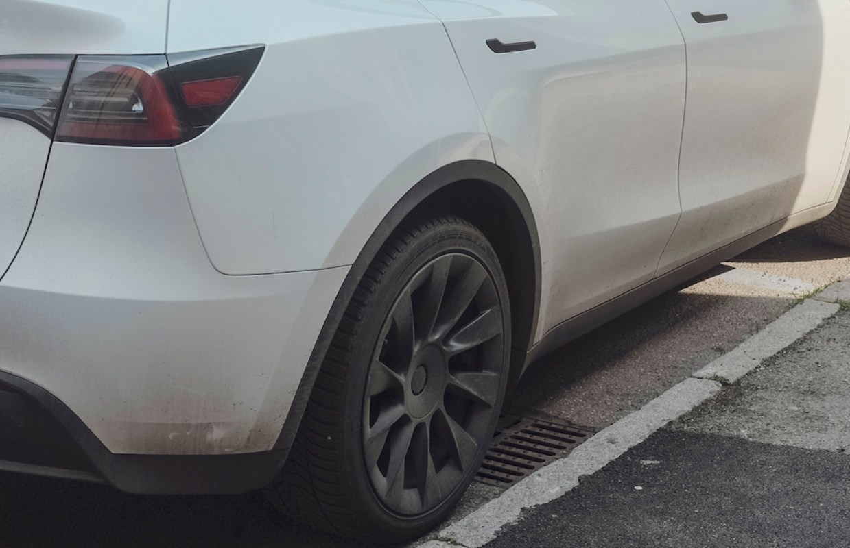 A close-up of a Tesla Model Y rear tire.