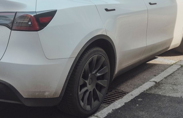 A close-up of a Tesla Model Y rear tire.