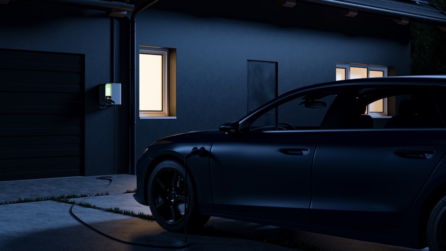 An EV charging outside a home.