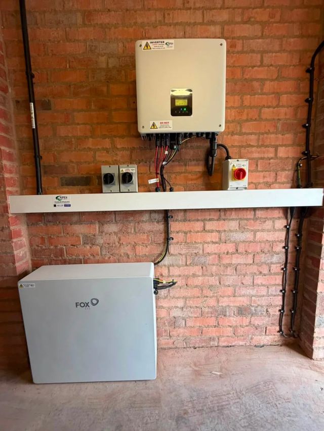 A solar inverter and other parts of a solar system.