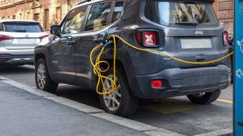 A charging Jeep 4xe hybrid EV.
