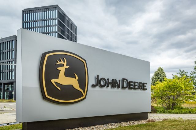 A John Deere sign.