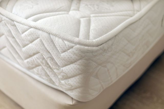 Corner of a white mattress