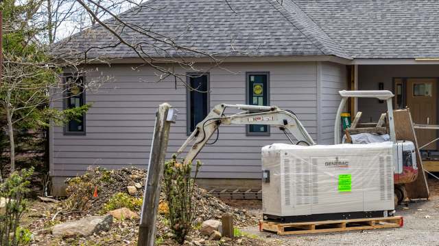 A construction site with a Generac generator.