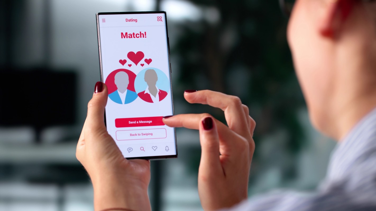 A person using a dating app showing a "Match!" screen with options to send a message.