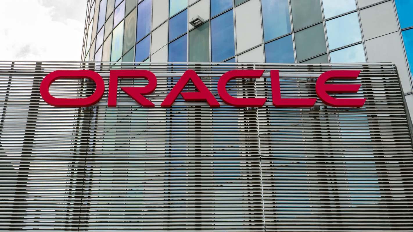 The Oracle logo displayed on a modern building facade.
