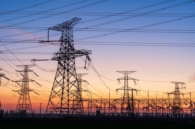 Pylons, substations, and high-voltage transmission lines.