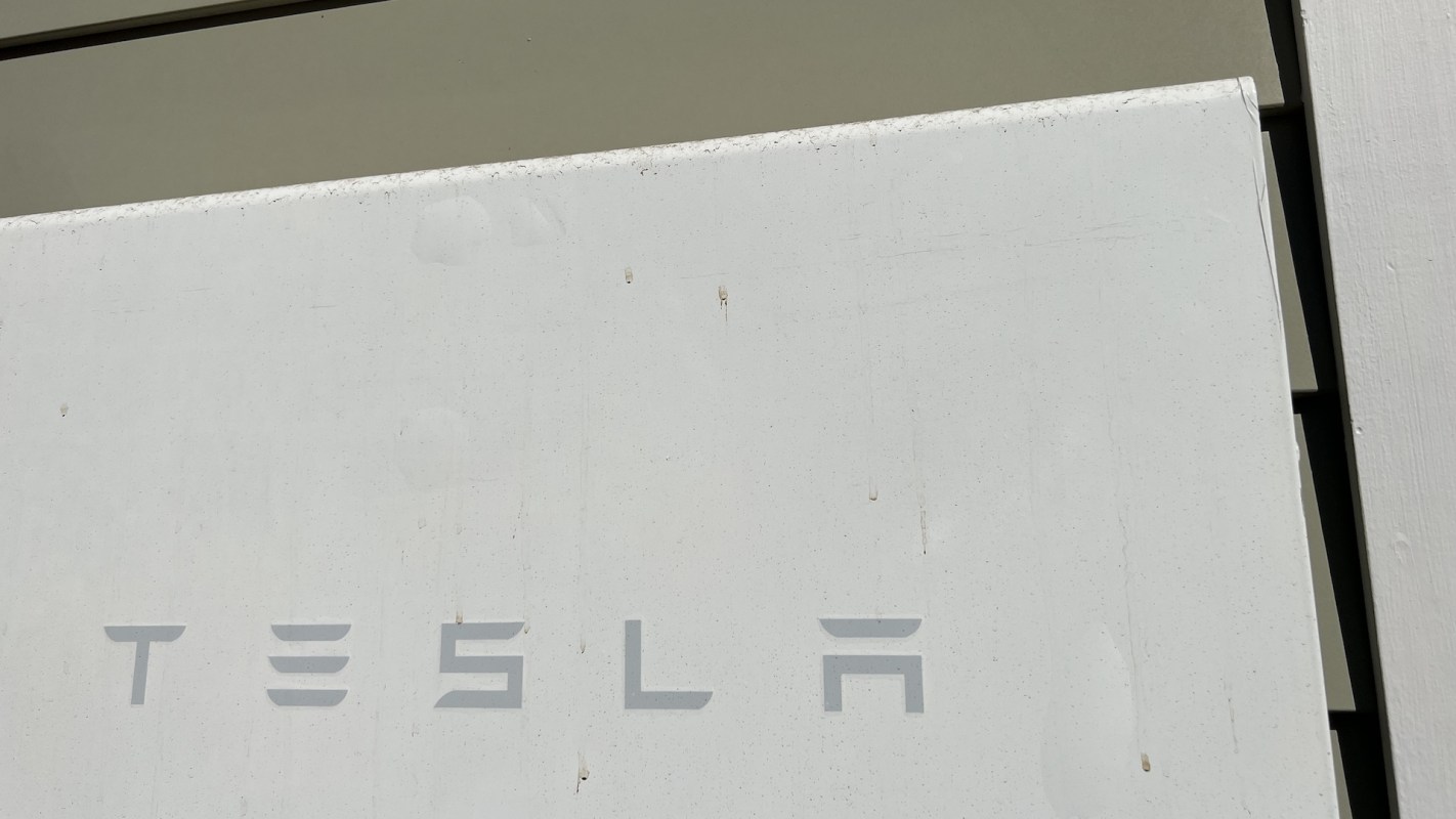 A white surface with the logo "TESLA" partially visible.