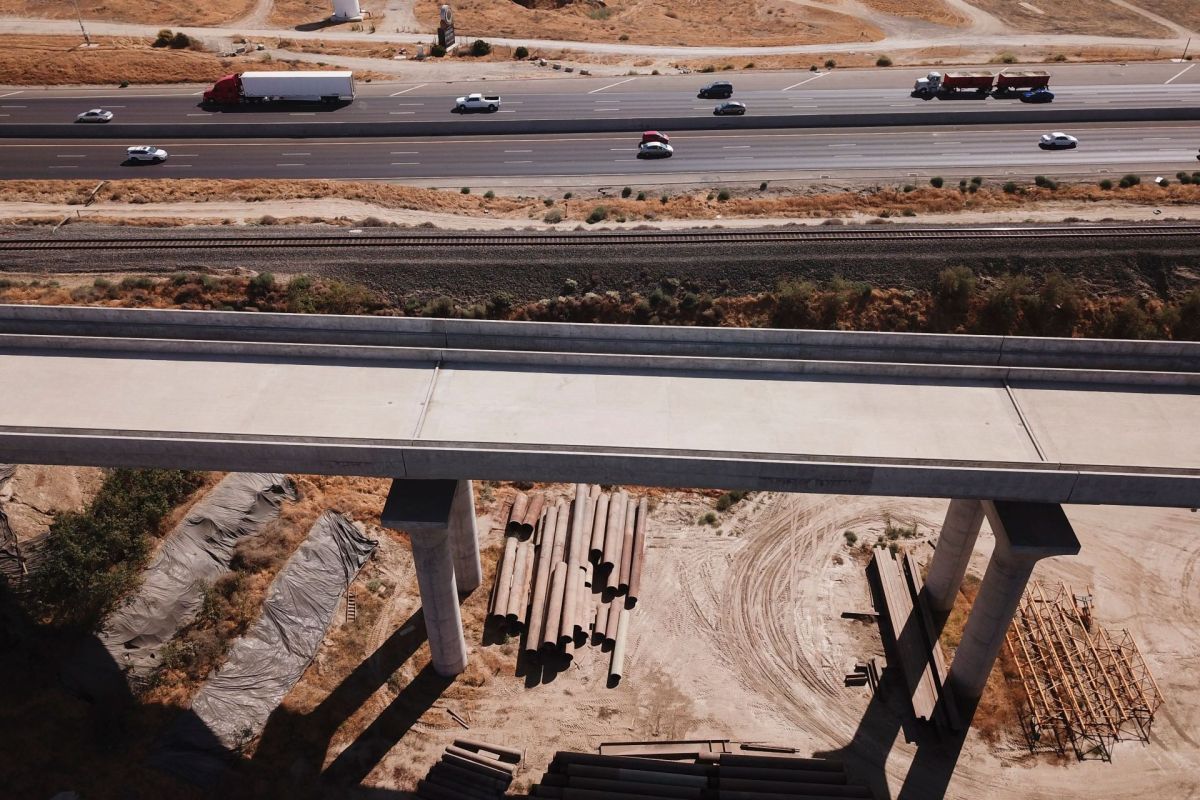 The California High Speed Rail Authority San Joaquin River viaduct construction project alongside U.S. Highway 99.