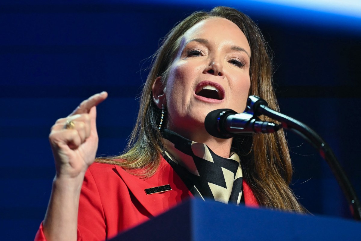 Agriculture secretary Brooke Rollins speaks into a microphone while gesturing with her hand.