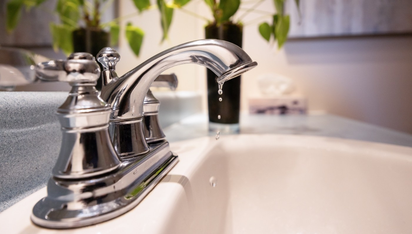 Water dripping from a faucet.