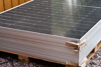 Solar panels on a wooden pallet.