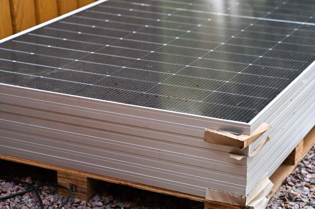 Solar panels on a wooden pallet.