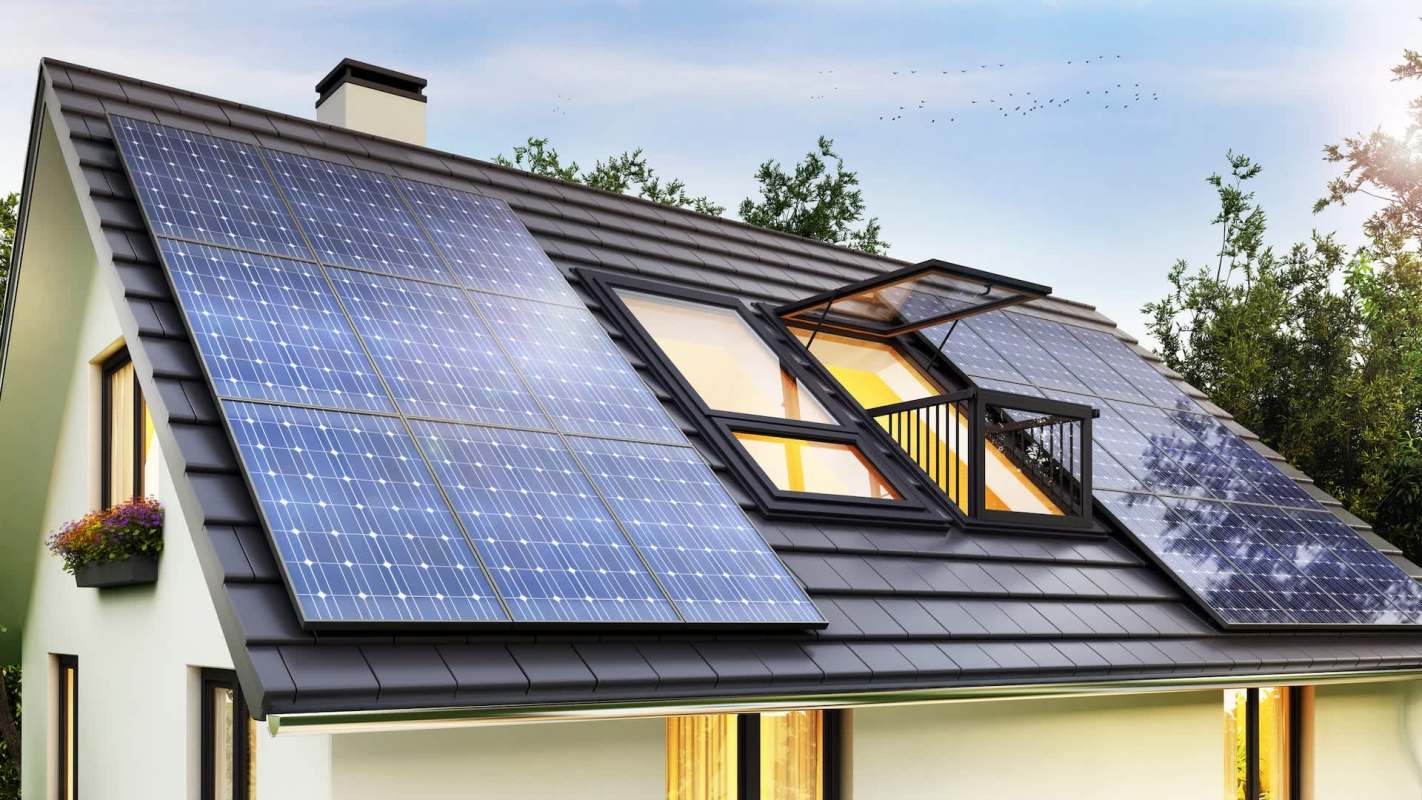 A house roof with solar panels and a large skylight.
