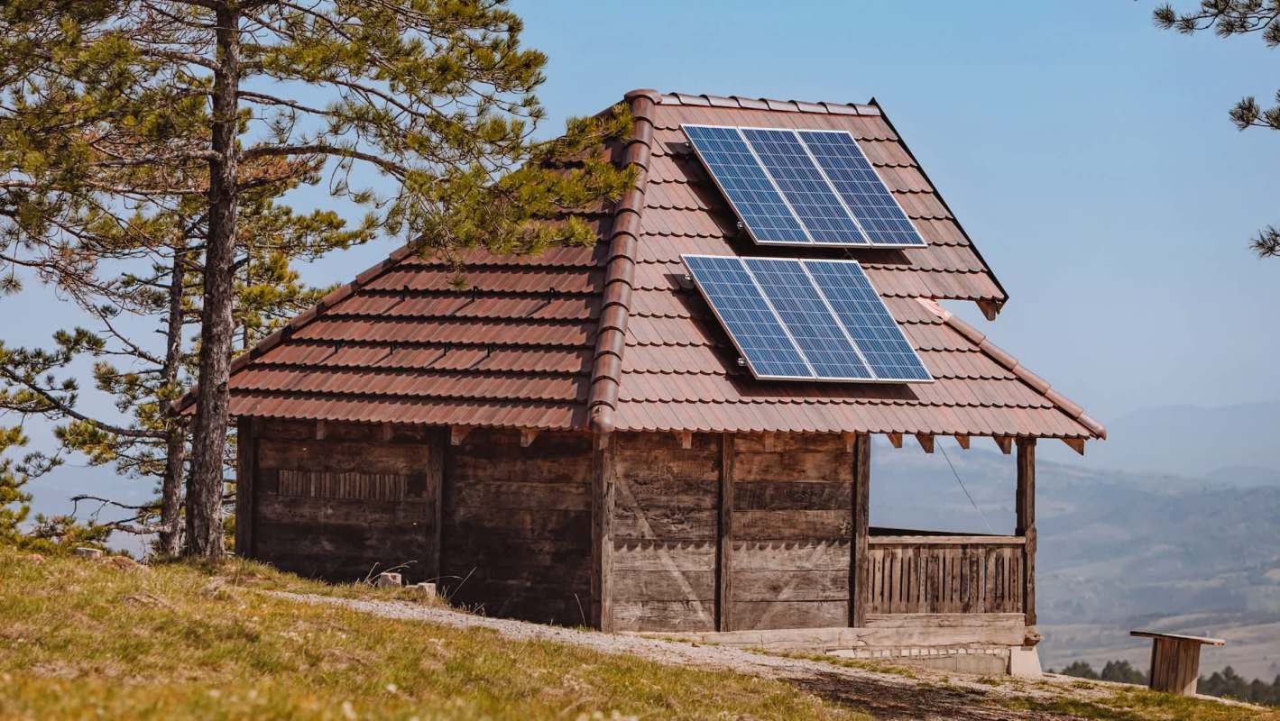 A cabin with solar panels.