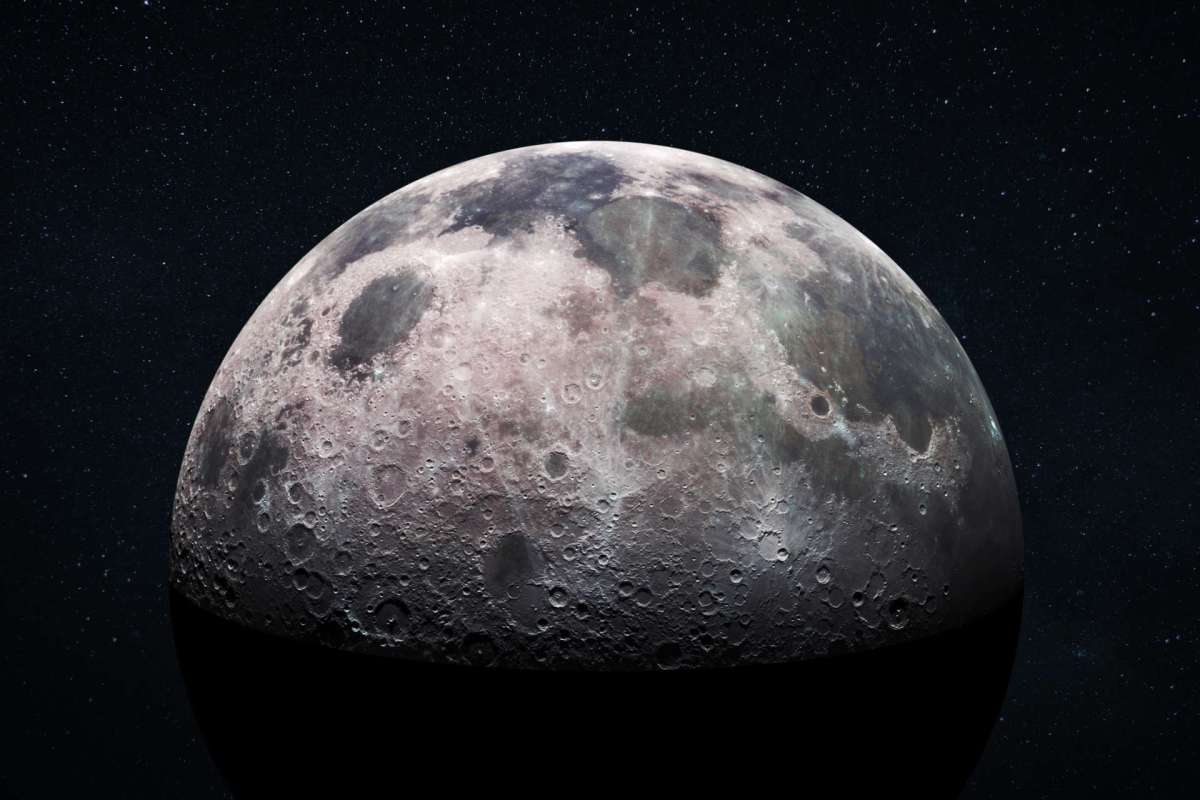 A detailed view of the moon's surface with craters against a starry background.