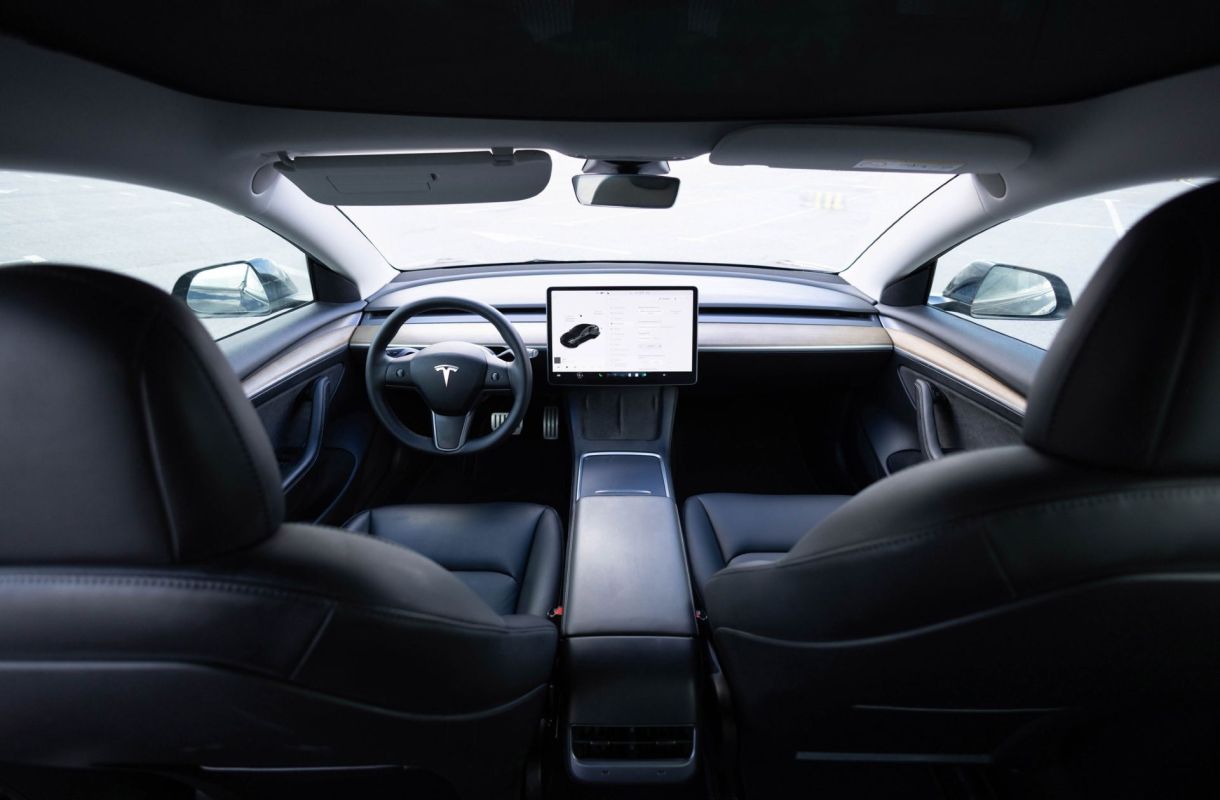 The inside of a Tesla.