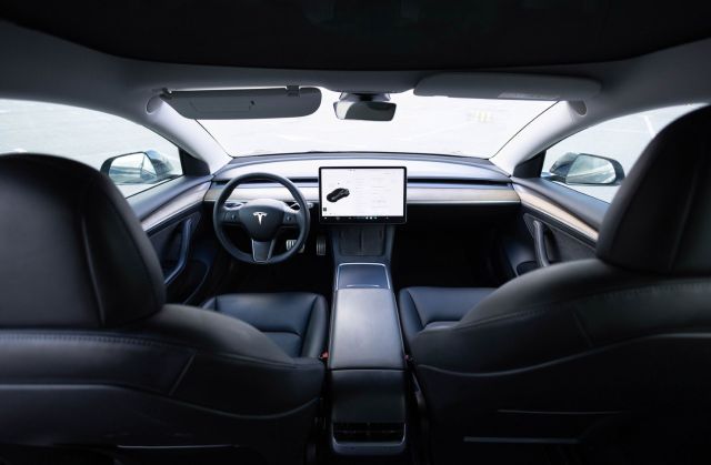 The inside of a Tesla.