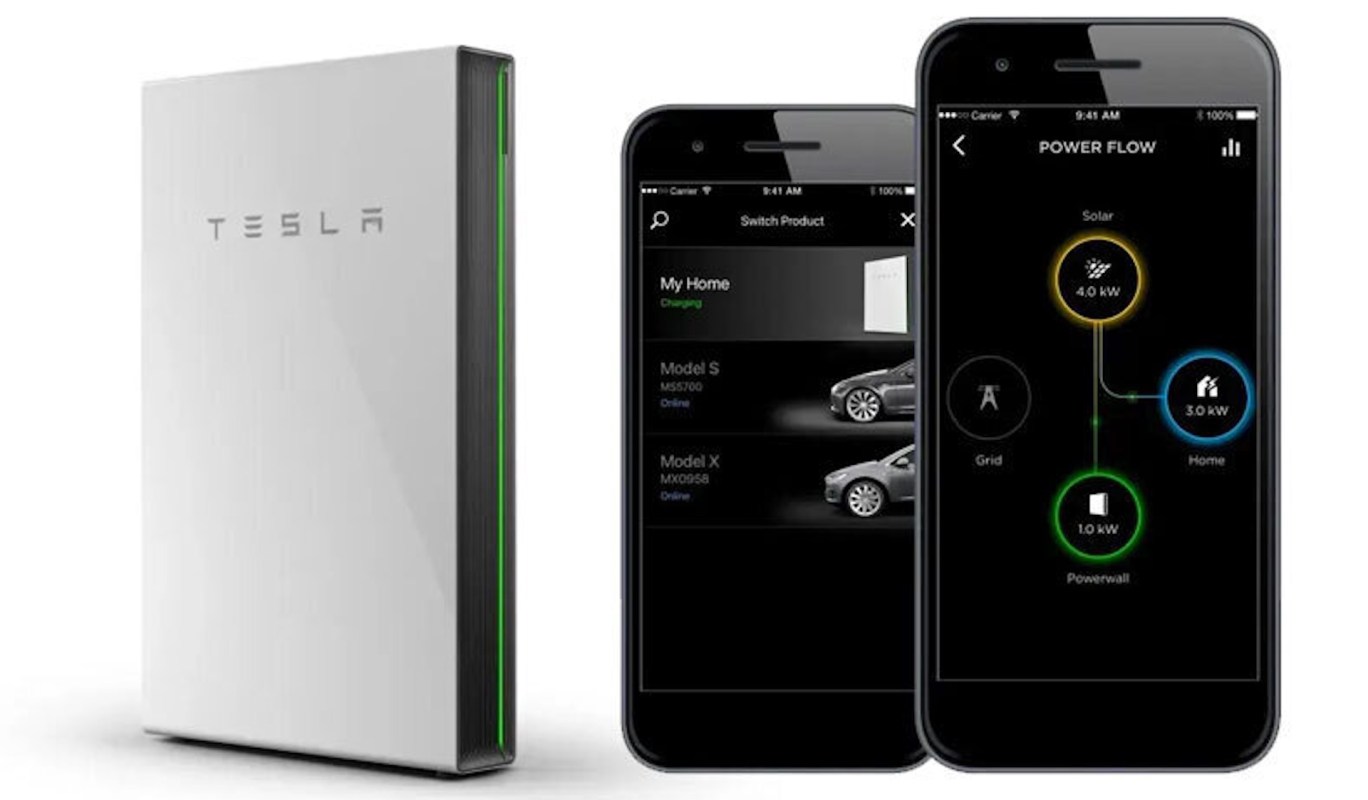 A Tesla Powerwall and two smartphones displaying energy management apps.