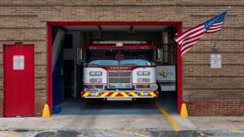 A fire truck in a fire station.