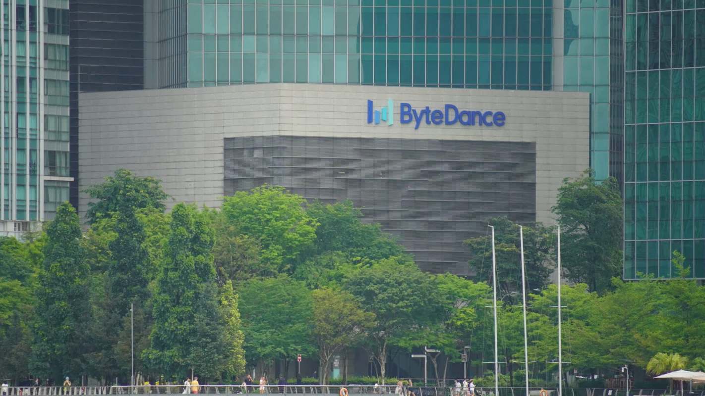 A building with the ByteDance logo surrounded by trees.