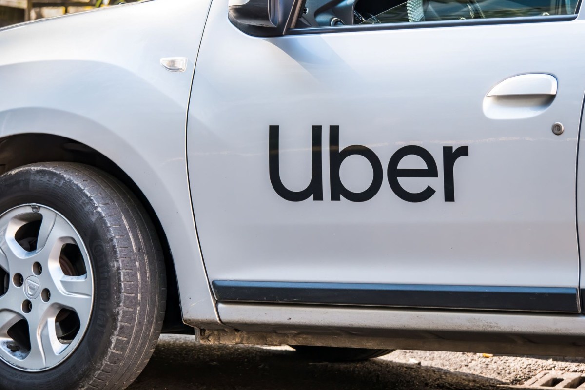 An Uber logo on a car.