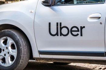 An Uber logo on a car.