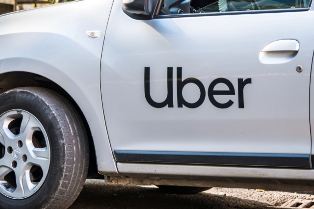 An Uber logo on a car.