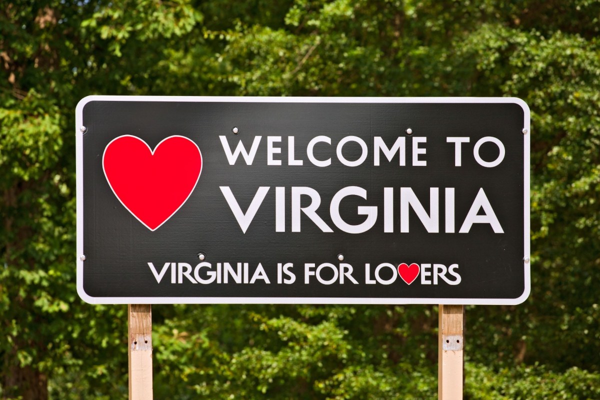 A "Welcome to Virginia, Virginia is for Lovers" road sign.