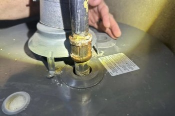 A backdrafting water heater.