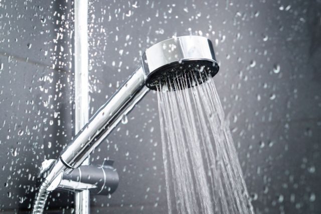 Water falling from a shower.