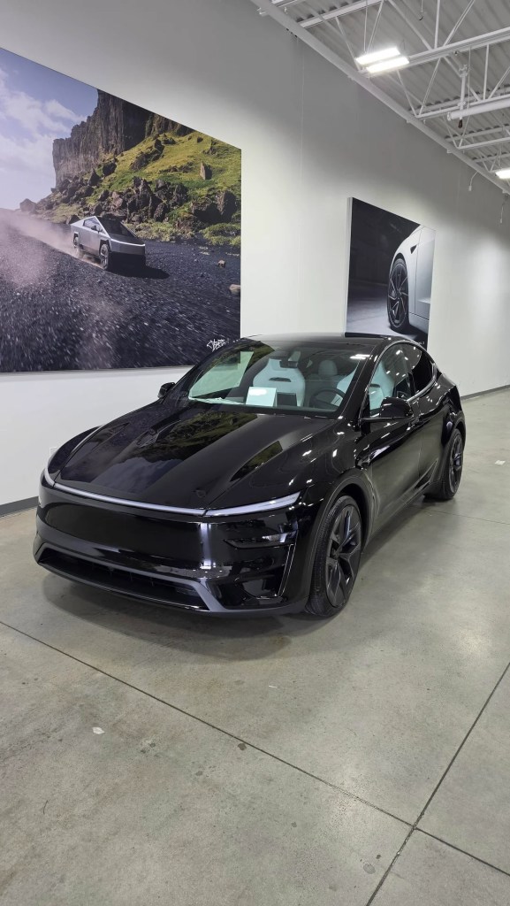 A black Tesla Model Y.