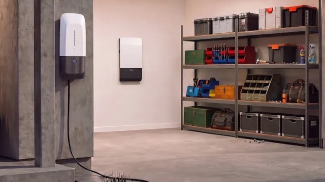 A wall-mounted battery storage unit.